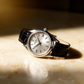Rolex Chameleon 18k white gold ladies' watch on cream marble
